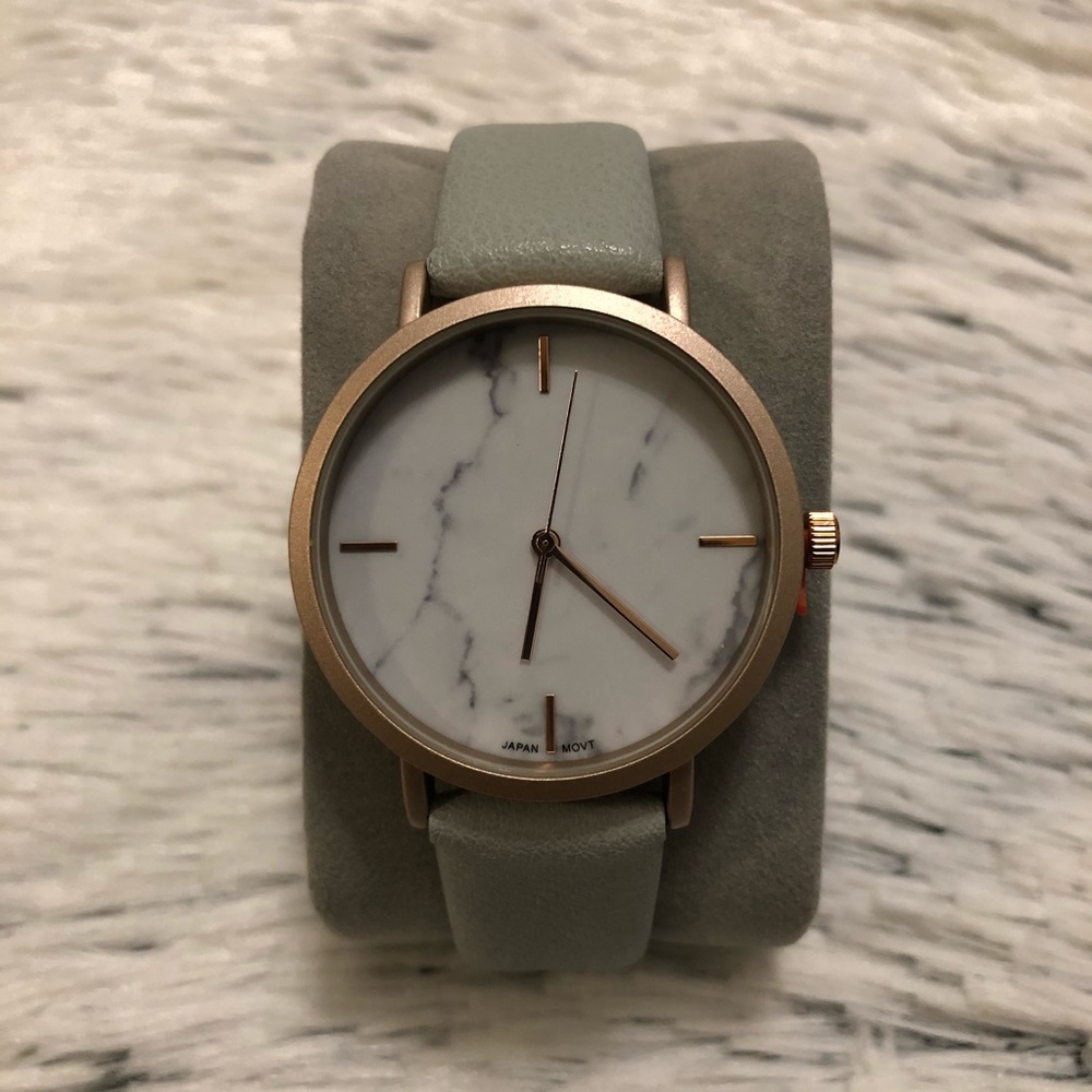 White marble face rose gold and pastel blue watch